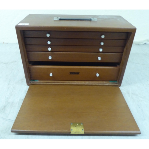 54 - A 1970s Union teak tool chest (empty) with a panelled door front, enclosing five graduated drawers, ... 