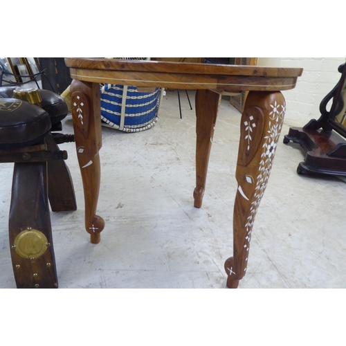 66 - An Indian style faux bone/ebony inlaid, teak occasional table  18