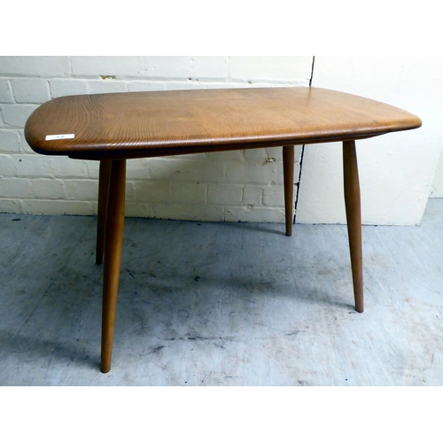 72 - An Ercol lozenge shaped, beech and elm occasional table, raised on turned legs  17