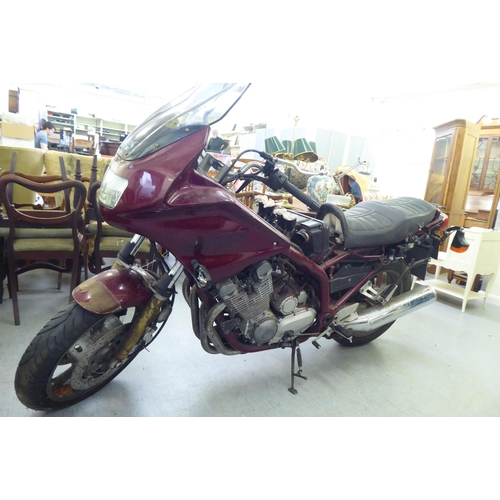 79 - A 'barn find' 1999 Yamaha 900 motorcycle in maroon livery, 892cc 4 cylinder, petrol (partly dismantl... 