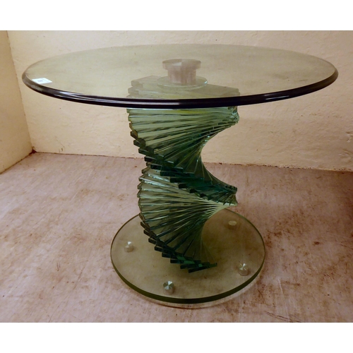 89 - A glass occasional table with a swirling staircase style pedestal  20