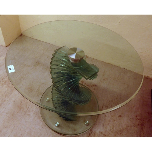 89 - A glass occasional table with a swirling staircase style pedestal  20