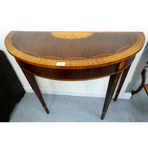 408 - A modern reproduction of a Georgian crossbanded string inlaid D-end console table, raised on square,... 