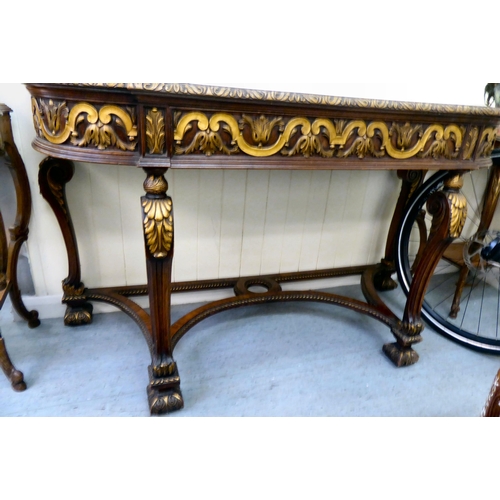 432 - An early 20thC Continental crossbanded burr walnut and other veneer and gilded inverted breakfront s... 