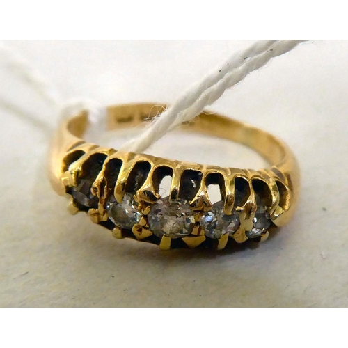 440 - An 18ct gold five stone diamond ring 