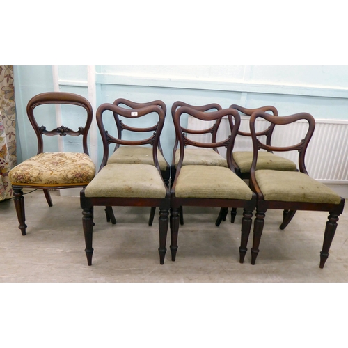 404 - A set of six Victorian mahogany framed balloon back dining chairs with horizontal carved splats and ... 