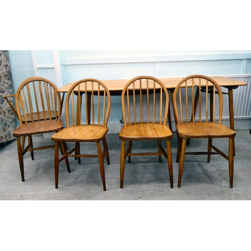 407 - Vintage Ercol beech and elm furniture, comprising four low hoop and spindled back dining chairs; a s... 