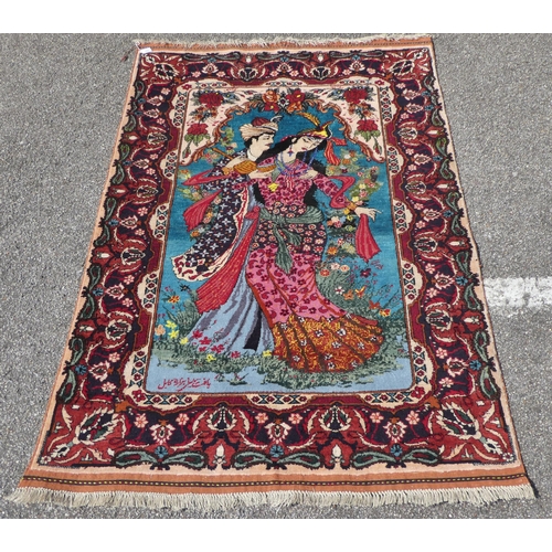 280 - An Afghan silk pictorial rug, decorated with a romantic couple, bordered by floral designs, on a mul... 