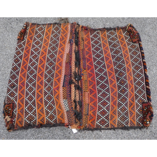 273 - A Qashqai saddle bag, decorated in bright colours