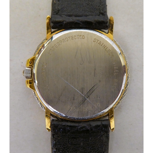 104 - A bi-coloured stainless steel cased wristwatch, the quartz movement faced by a silvered steel baton ... 