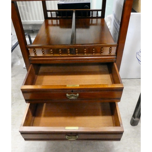 106 - An Edwardian mahogany one-piece writing desk, the desk top with glazed and drawer sections, incorpor... 