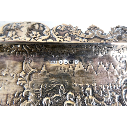 2 - Metalware: to include an early 20thC silver pen tray, embossed with a Dutch scene  bears indist... 