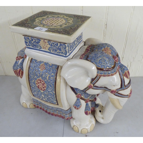 23 - A modern china garden seat, fashioned as an elephant  17