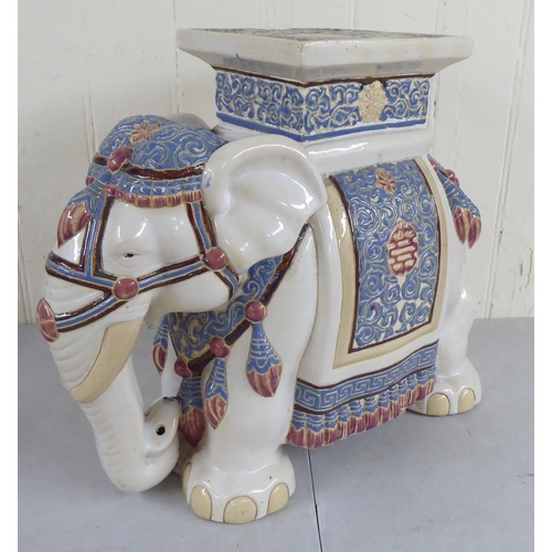 23 - A modern china garden seat, fashioned as an elephant  17