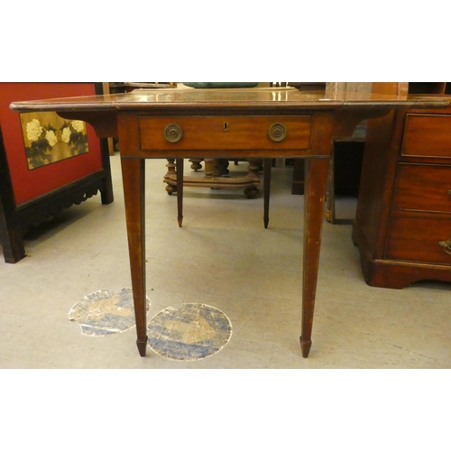 256 - A late 19thC satin mahogany and crossbanded Pembroke table, the top with round corners, over an end ... 