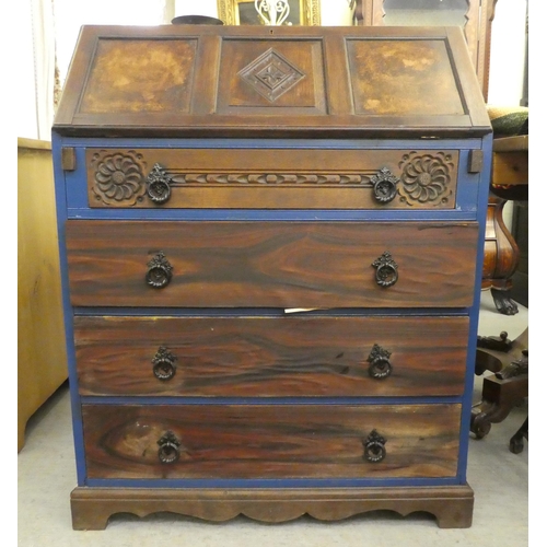 257 - A mid 20thC oak bureau with a fall flap, over three long drawers, raised on bracket feet  39