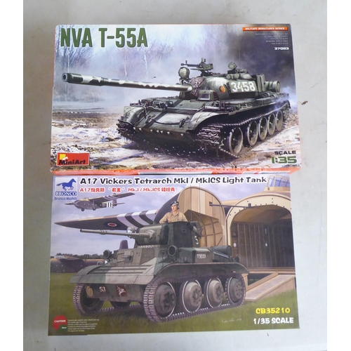 260 - 1/35 scale model kits: to include a Chevrolet C15TA by IBG Models; and an NVA T-55A by Mini Art ... 