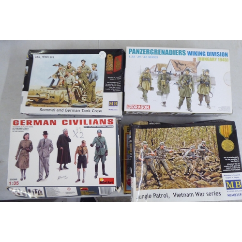 260 - 1/35 scale model kits: to include a Chevrolet C15TA by IBG Models; and an NVA T-55A by Mini Art ... 