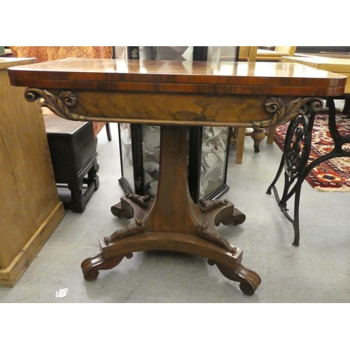 262 - A William IV rosewood card table with a fold-over top, enclosing a baize lined interior, raised on a... 