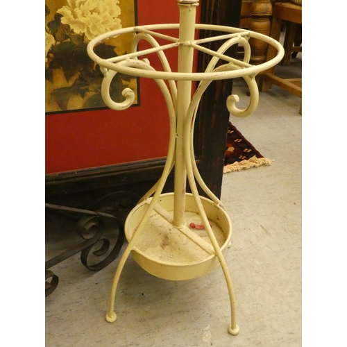 263 - A mixed lot: to include a wrought iron candlestand, on a tripod base  50