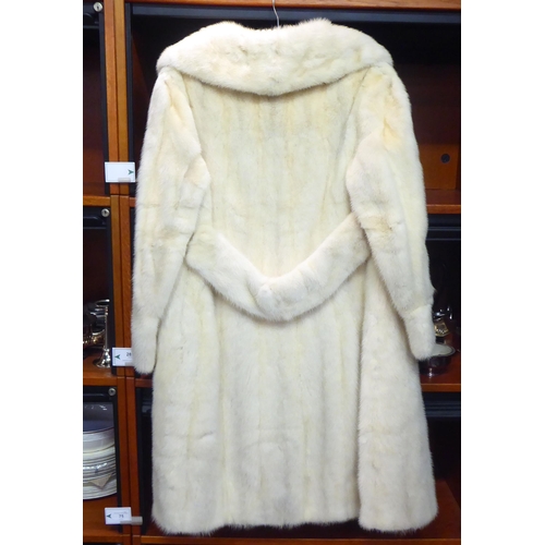 266 - A lady's blonde mink three-quarter length coat  approx size 14