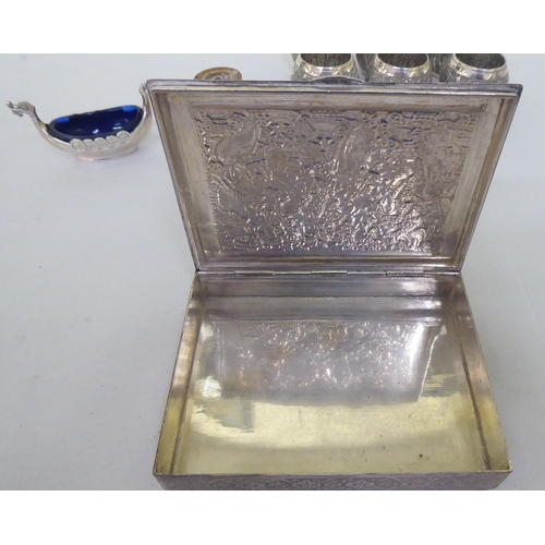 276 - White metal collectables: to include a cigarette box, decorated with Indian figures  5