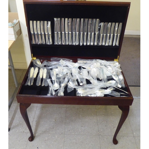 297 - A canteen of bead pattern silver cutlery and flatware