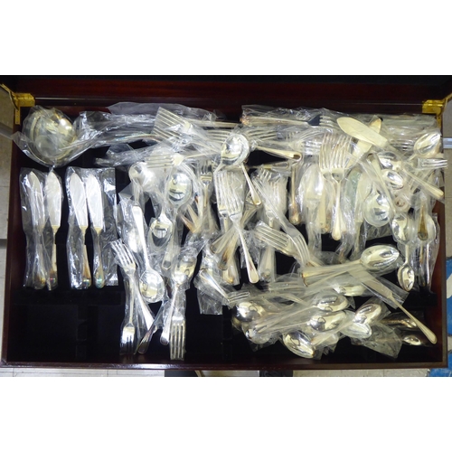 297 - A canteen of bead pattern silver cutlery and flatware