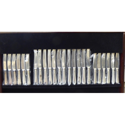 297 - A canteen of bead pattern silver cutlery and flatware