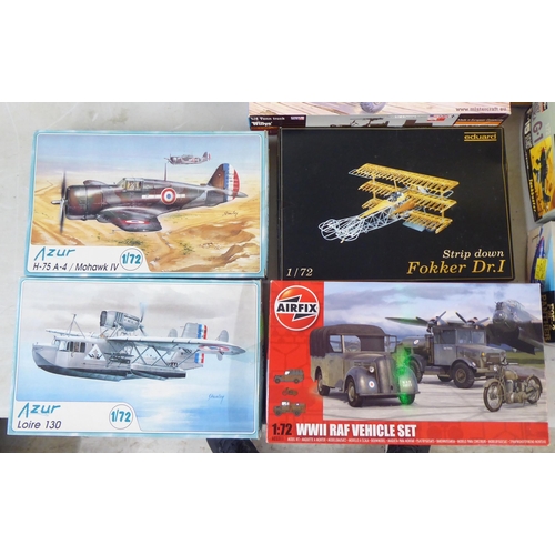 33 - 1/72 scale model kits: to include a Spitfire Mk.IX by Italeri; and a Felixstowe F.2A by Roden  ... 