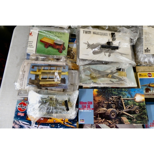 33 - 1/72 scale model kits: to include a Spitfire Mk.IX by Italeri; and a Felixstowe F.2A by Roden  ... 