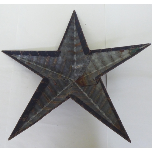 34 - A painted, galvanised iron Amish barn star  24