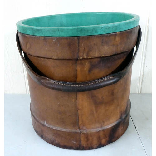 36 - A brown hide clad coal bucket, bearing a crest  13