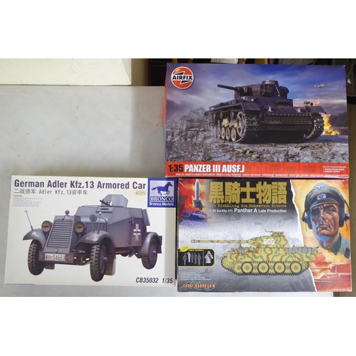 39 - 1/35 scale model kits: to include an Airfix Panzer III Ausf.j; and British Infantry on Patrol by Tam... 