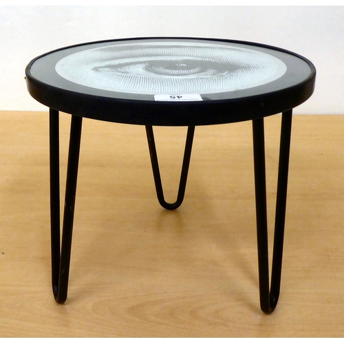 45 - A Cole & Son table stool, based on the Fornasetti Collection by Tema e Variazioni, raised on bla... 