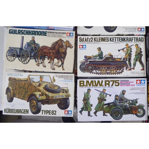 57 - 1/35 scale model kits: to include a Kubelwagen Type 82 by Tamiya; and a Dingo Mk 1b by Mini Art ... 