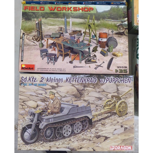 57 - 1/35 scale model kits: to include a Kubelwagen Type 82 by Tamiya; and a Dingo Mk 1b by Mini Art ... 