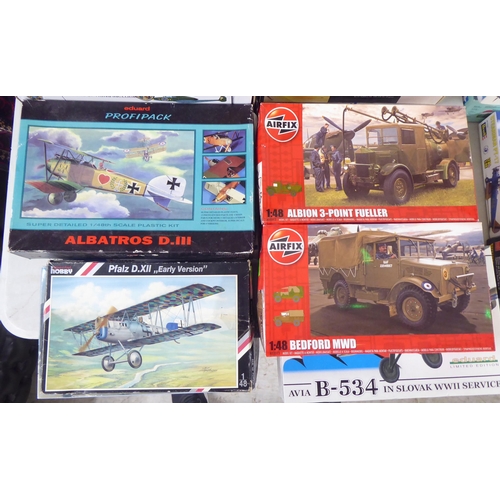 62 - 1/48 scale model kits: to include a Fiesler Fi156C Storch by Tamiya; and a SBD 5 Dauntless by Italer... 