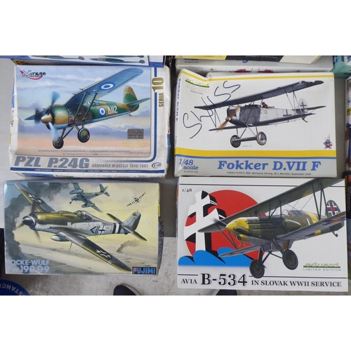 62 - 1/48 scale model kits: to include a Fiesler Fi156C Storch by Tamiya; and a SBD 5 Dauntless by Italer... 