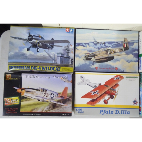 62 - 1/48 scale model kits: to include a Fiesler Fi156C Storch by Tamiya; and a SBD 5 Dauntless by Italer... 