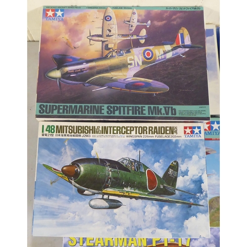 62 - 1/48 scale model kits: to include a Fiesler Fi156C Storch by Tamiya; and a SBD 5 Dauntless by Italer... 