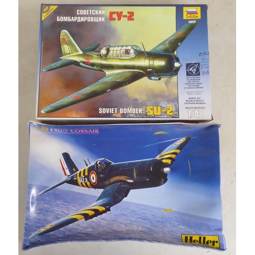 62 - 1/48 scale model kits: to include a Fiesler Fi156C Storch by Tamiya; and a SBD 5 Dauntless by Italer... 