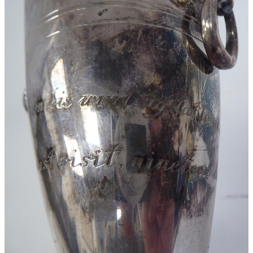 65 - A Cristoffle plated, twin handled vase, inscribed as 'used by King Edward VII at the Pabis Hotel, Bi... 