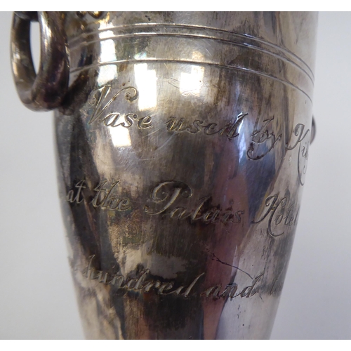 65 - A Cristoffle plated, twin handled vase, inscribed as 'used by King Edward VII at the Pabis Hotel, Bi... 