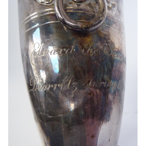 65 - A Cristoffle plated, twin handled vase, inscribed as 'used by King Edward VII at the Pabis Hotel, Bi... 