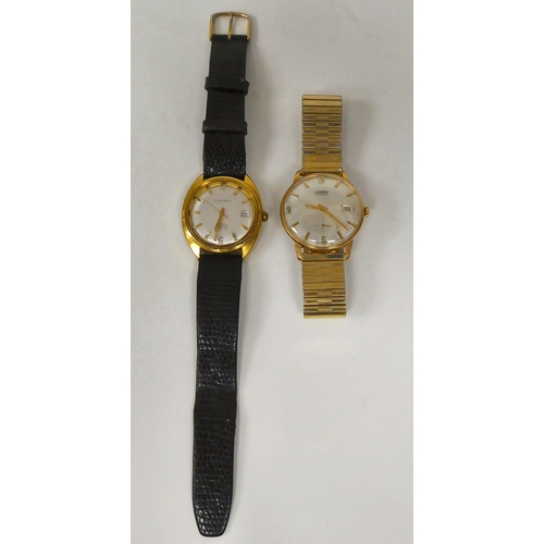 79 - Two gold plated stainless steel wristwatches, viz. a Roamer Incabloc, faced by an Arabic and baton d... 