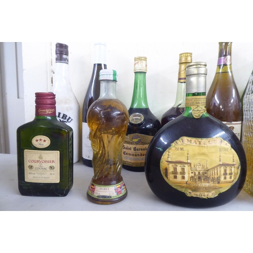 9 - Wines and spirits: to include two bottles of Caldirola; and a Remy Martin Cognac