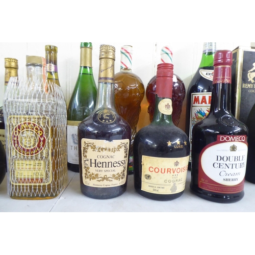 9 - Wines and spirits: to include two bottles of Caldirola; and a Remy Martin Cognac