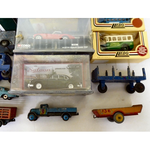 91 - Diecast model vehicles, many boxed: to include a Corgi Jaguar XK120; an Eddie Stobbart lorry; and a ... 