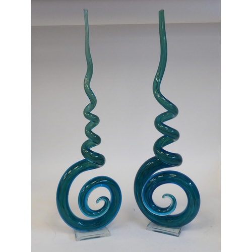 1 - A pair of mid 20thC Murano streaky turquoise coloured glass, spiral sculptures  21